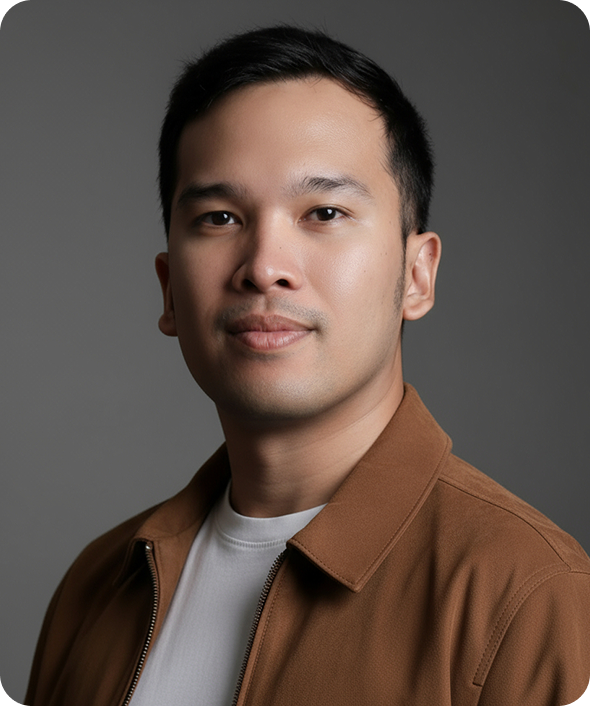 Portrait of Ricky Hilmi, Product Marketing Lead at DOKU and Product & Growth Mentor, wearing a brown jacket and smiling